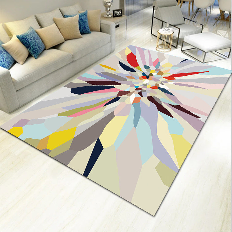 Several light geometric carpet mats